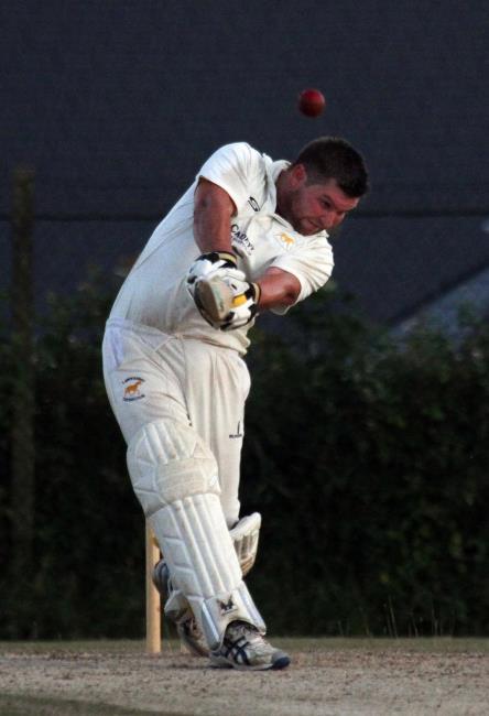Lawrenny skipper Joe Kidney dramatically hits winning six off the final delivery. Pictures by Susan and Brian McKehon